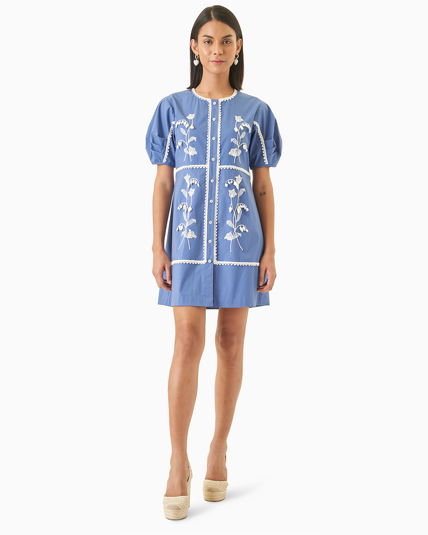 Full front view of Daffodil Dress - Blue Cotton Dress with floral embroidery, puff sleeves, and above-knee length in a relaxed fit.